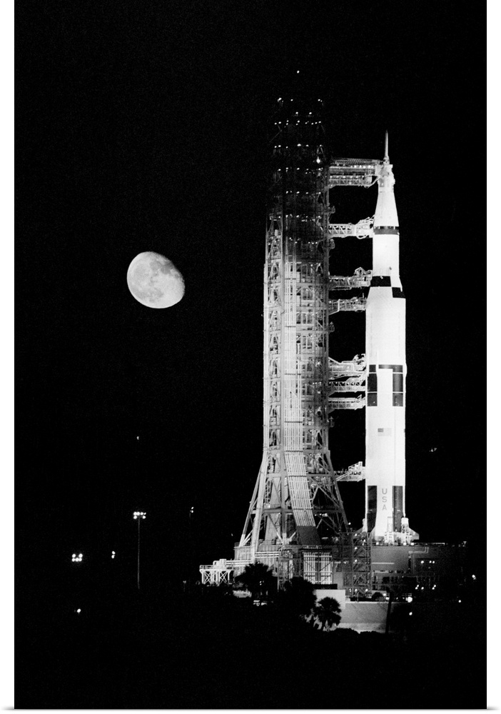 Kennedy Space Center, Fla. Mounted atop a Saturn 5 rocket, the Apollo 11 spacecraft in which Neil Armstrong and Buzz Aldri...