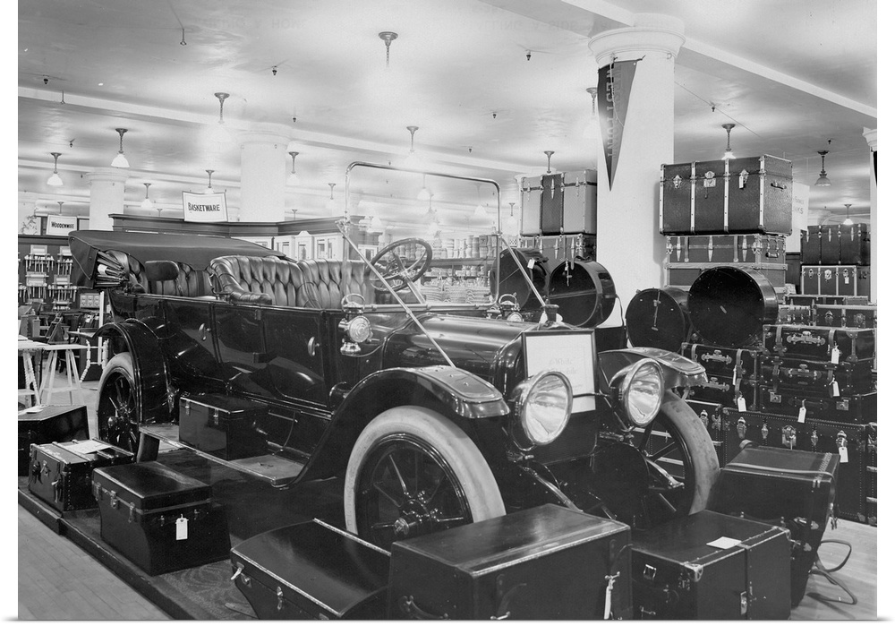 448-60 watt General Electric Mazda lamps illuminate the automobile department inside Gimbel's Department Store.