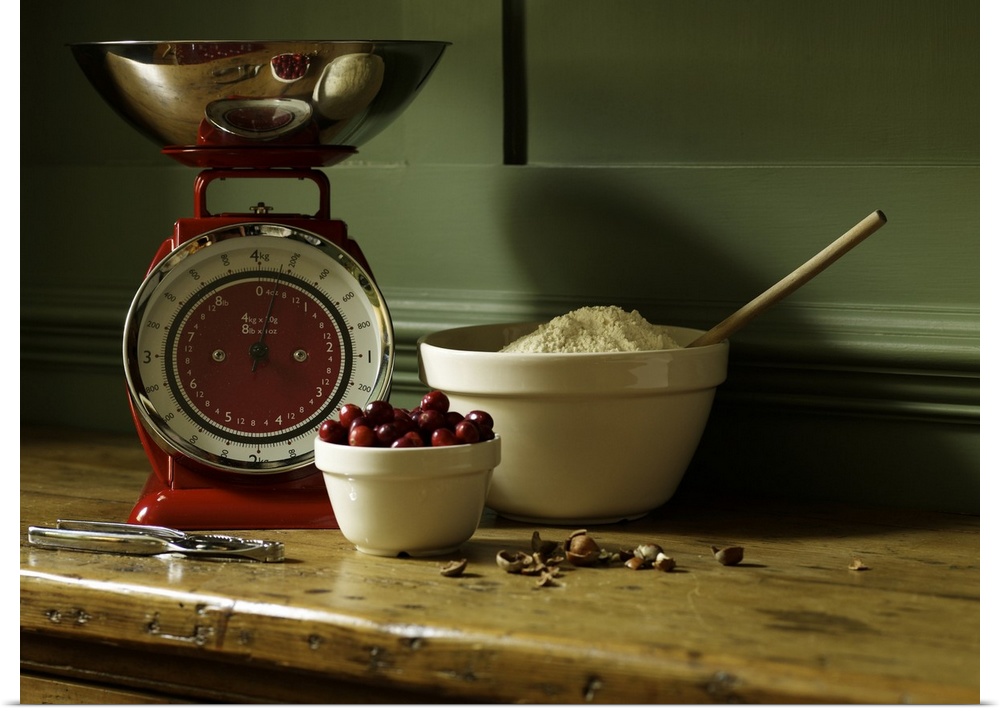 Photograph of flour, cherries, and scale for measuring food.