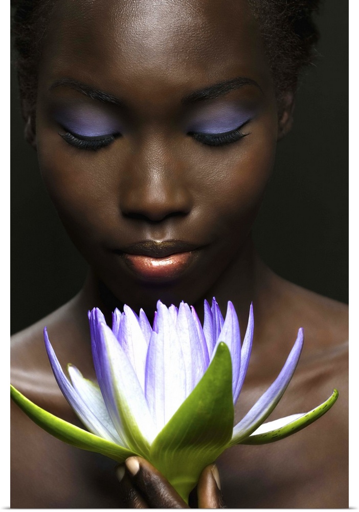 Afro-American woman with purple lotus flower