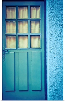Blue door with blue wall.
