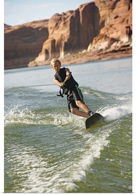 Boy wakeboarding on Lake Powell