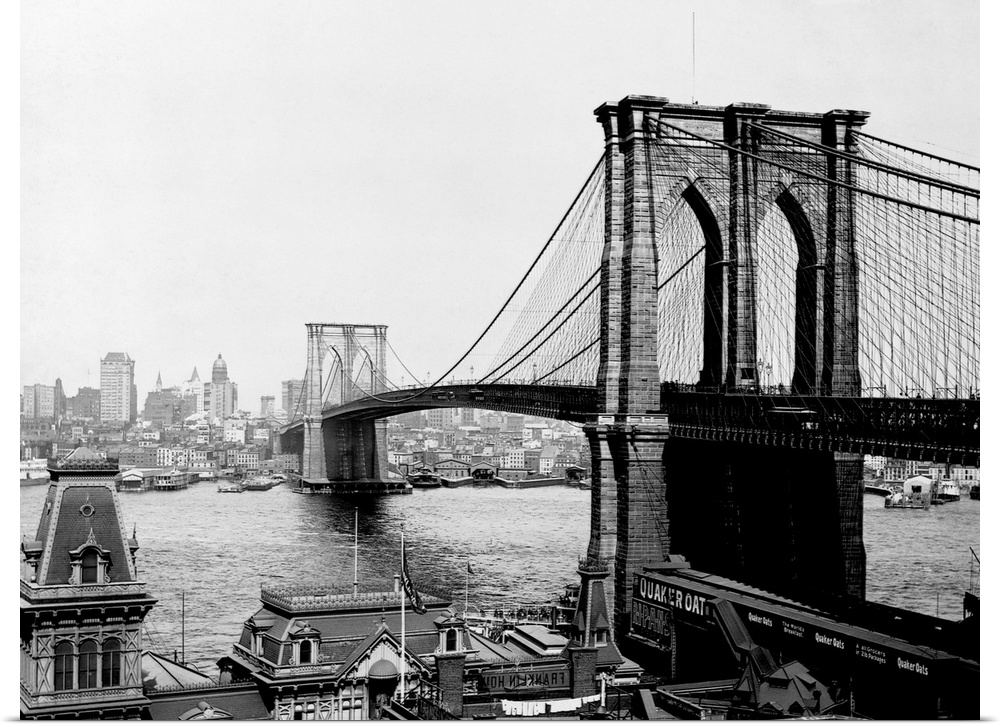 The Brooklyn Bridge, the largest suspension bridge and the first to ever be built with steel, spans the East River Between...