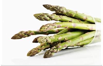 Bunch of asparagus in beaker