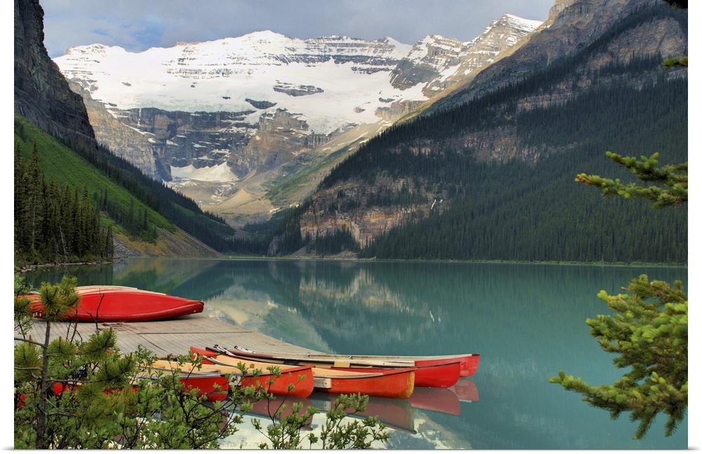 red canoes on Lake Louise in Banff National Park
