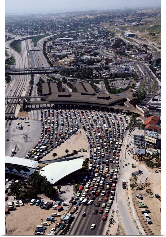 Cars line up at the border inspection station at San Ysidro, California, to cross between the United States and Baja Calif...