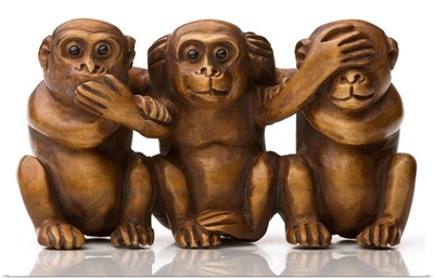 Carving of three silly wooden monkeys