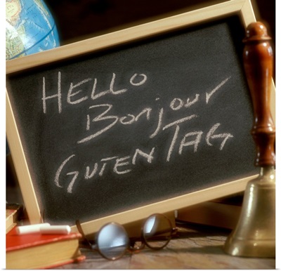 Chalkboard with greetings written in English, French and German