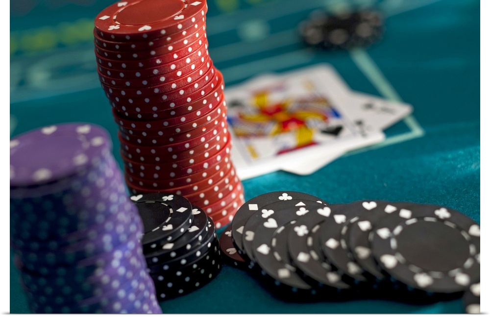 chips at casino table with cards on table