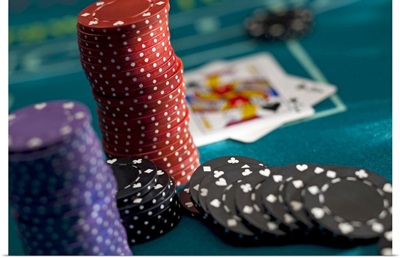 chips at casino table with cards on table