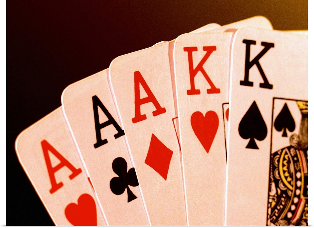 Close-up of a hand of aces
