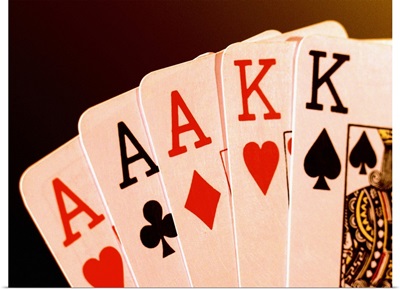 Close-up of a hand of aces