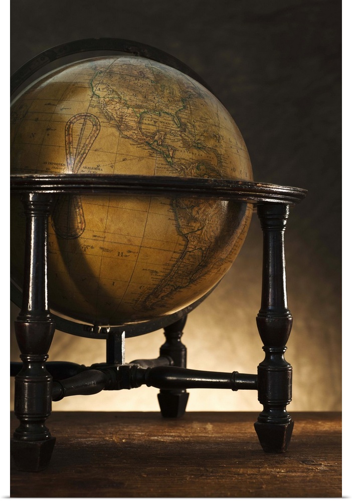 Close up of antique globe on table