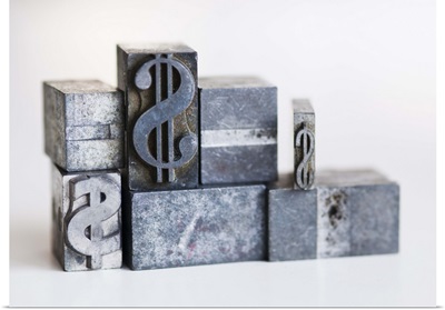 Close up of printing blocks with dollar sign