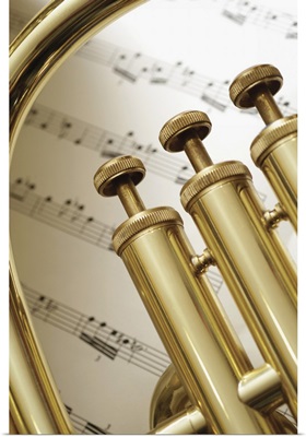 Close-up of trumpet and sheet music