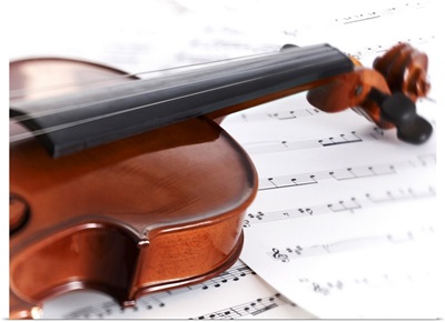 Close up of violin and sheet music