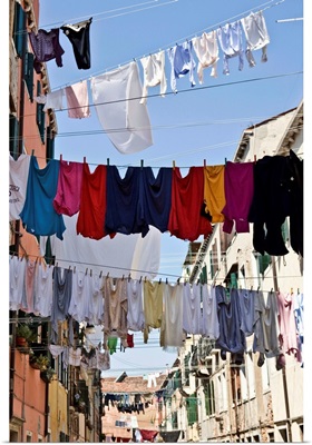 Clotheslines hanging from apartments in Venice, Italy