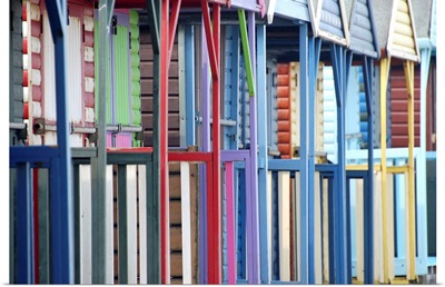 Colorful beach huts on Kent Coast.