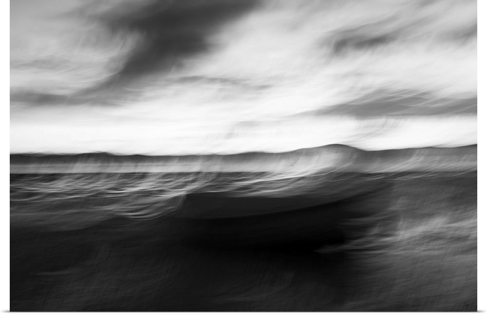 Monochrome intentional camera movement blurs of coastal impressionist style image in morning light. New Zealand.