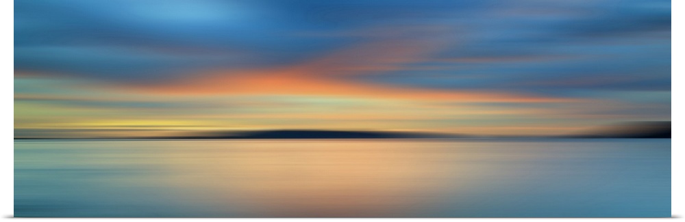 Motion blurred colorful sunset with long exposure effect.