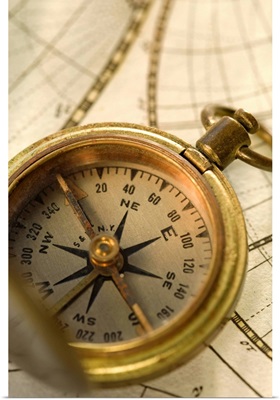 Compass on antique map