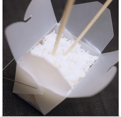 Cooked white rice in a to-go container