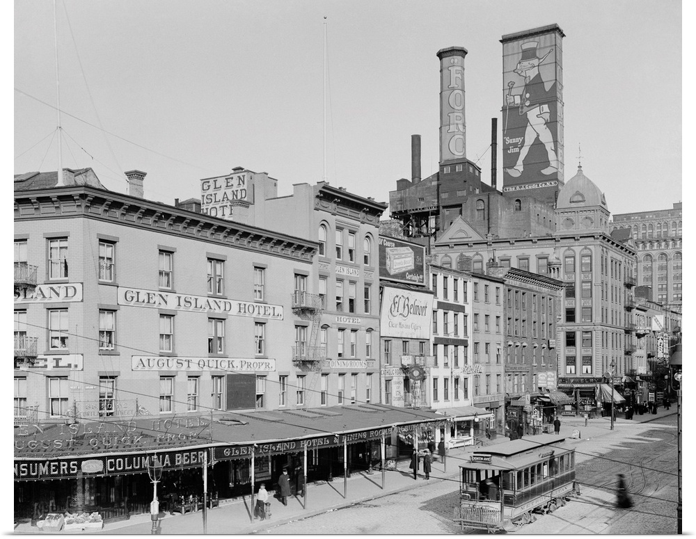 View of trolley passing Glen Island Hotel on Cortlandt Street.