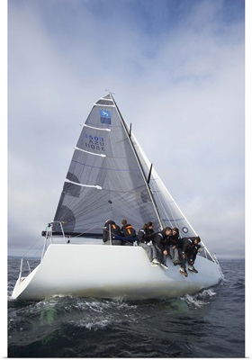 Crew members on racing yacht