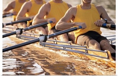 Crew team rowing a scull