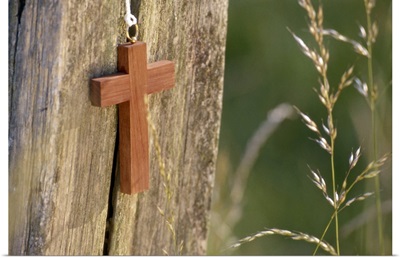 Cross against wood