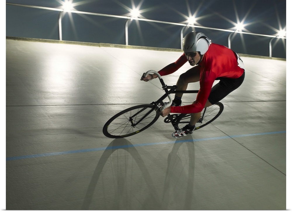 Cyclist in action on velodrome track
