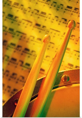 Drumsticks and sheet music