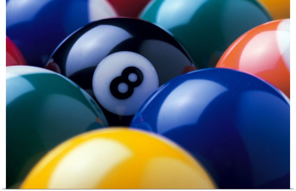 The focus of this picture is the eight ball as all other pool balls are turned so the number is not shown.