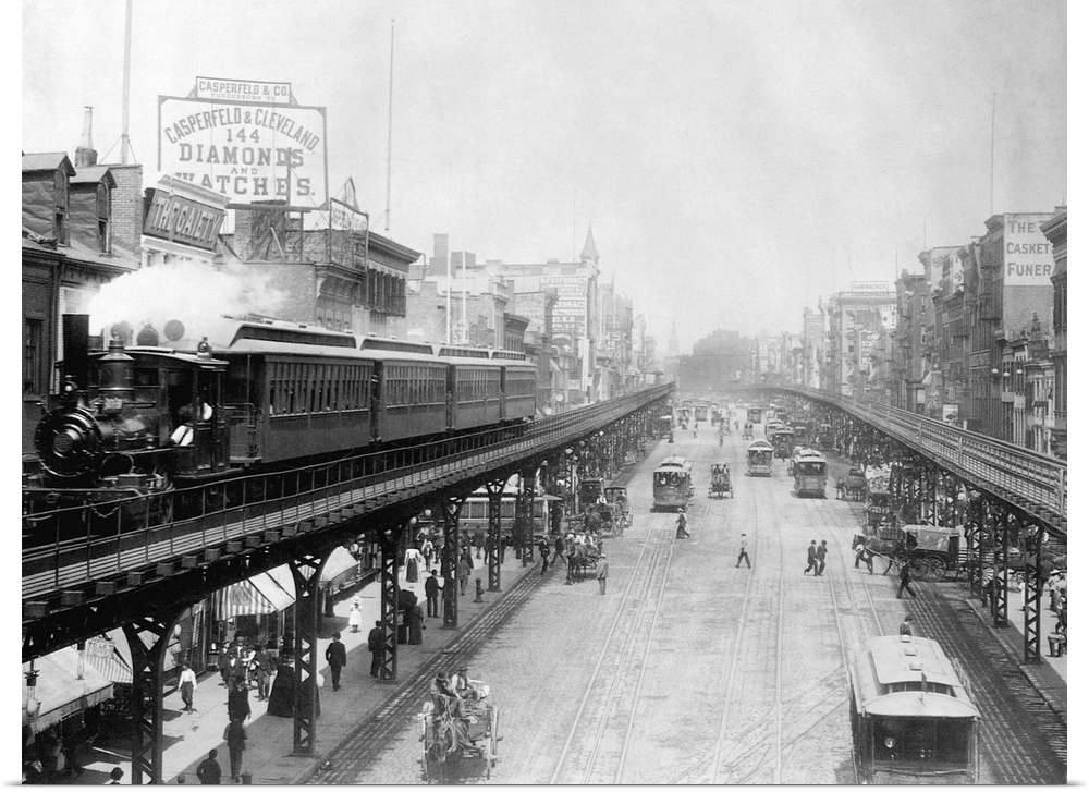Elevated trains roll over busy streets in Manhattan's Bowery neighborhood.