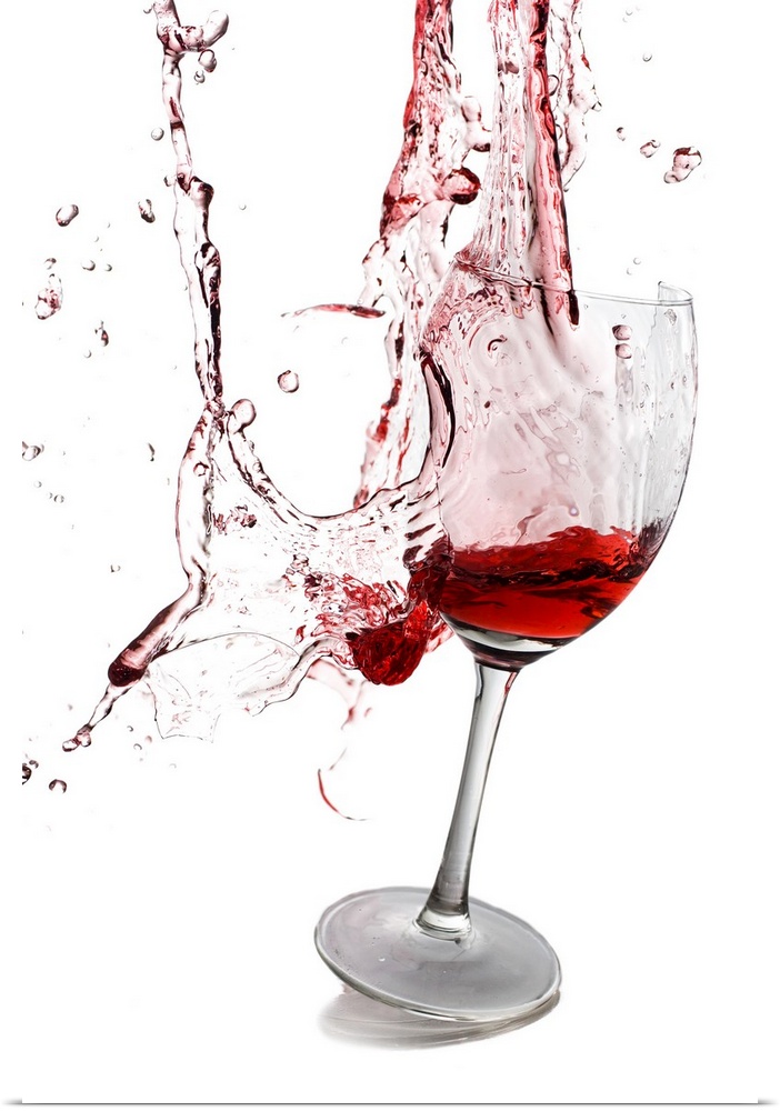 Portrait photograph on a large wall hanging of a slightly tilted glass of red wine, the goblet appears to be exploding and...