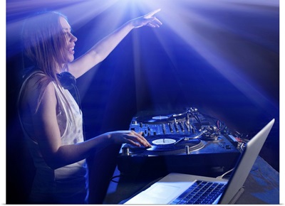 Female DJ in Nightclub Reaching Out to Audience