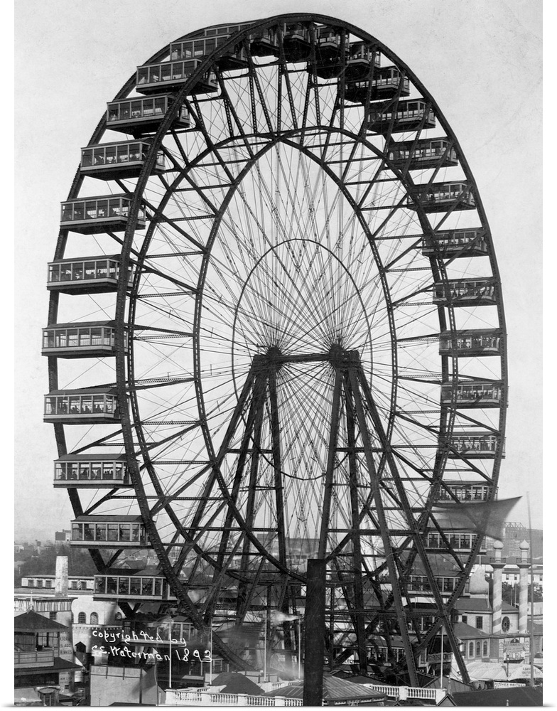 The ferris wheel turns on the World's Columbian Exposition fairgrounds in 1893. Chicago, Illinois, USA.
