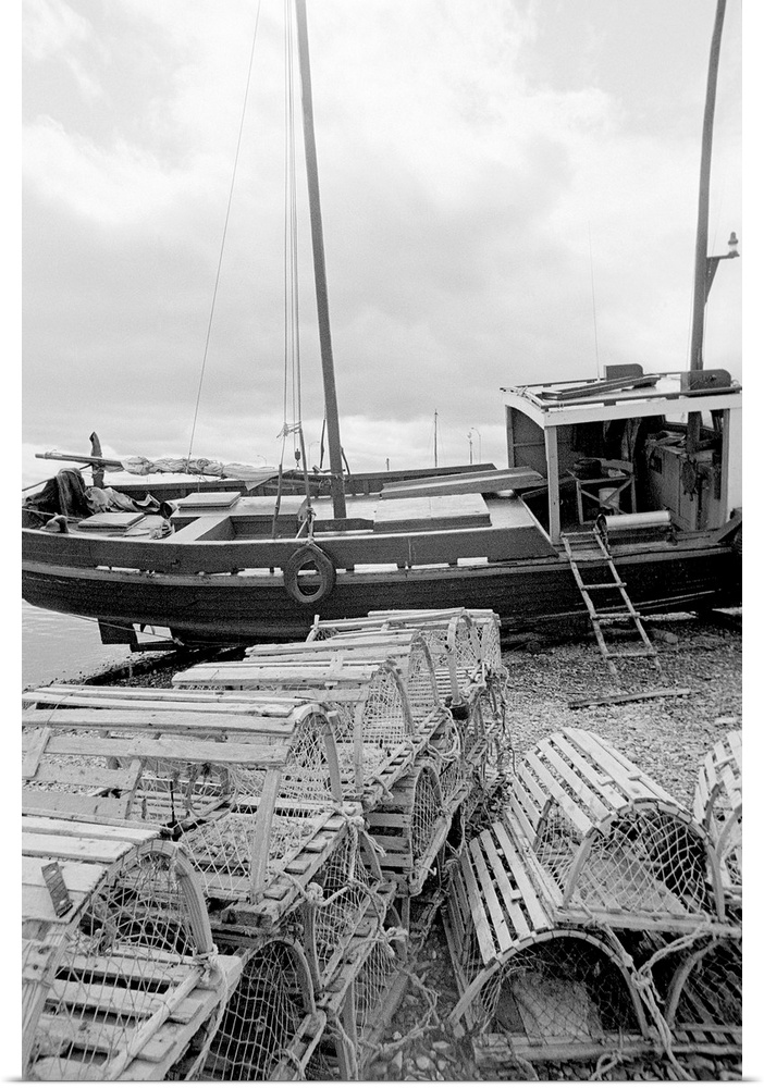 black and white image of fishing vessel and lobster traps