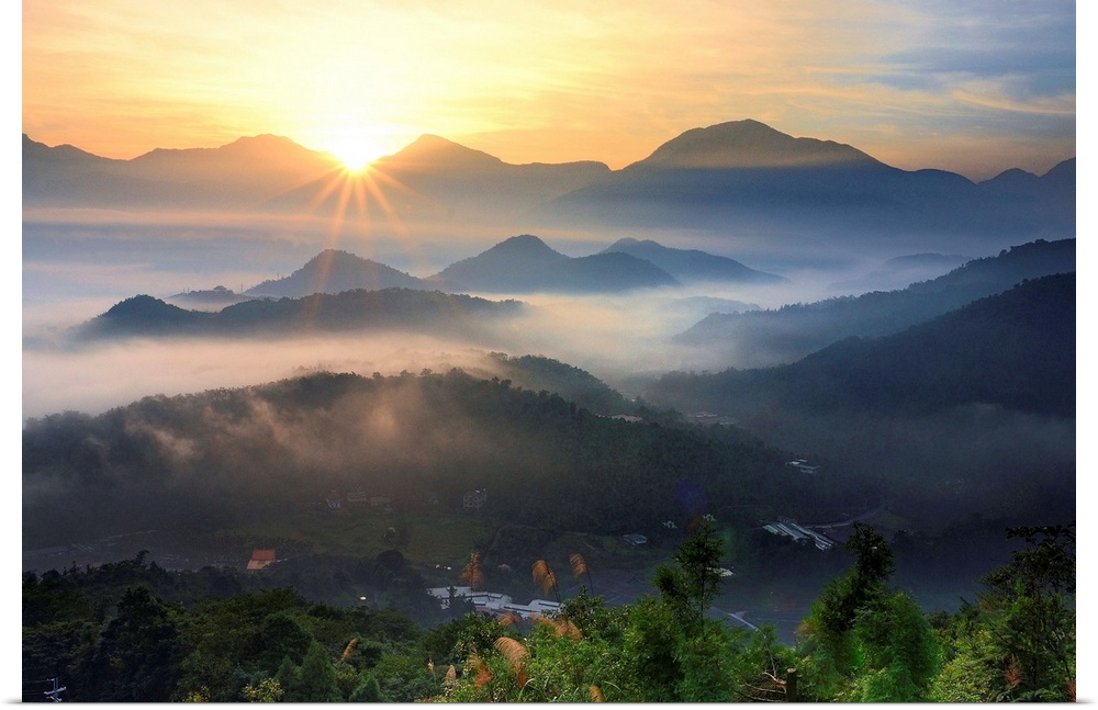 Foggy mountain at sunrise, in Nantou County, Taiwan.