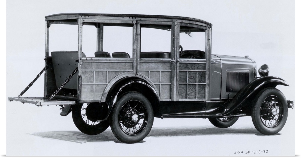 Photo shows a Ford Model A station wagon; a Woody. Photograph, ca. 1900s-1910s.