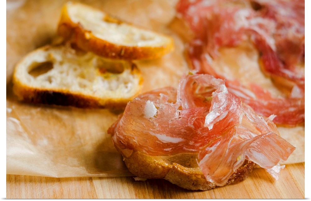 Fresh prosciutto ham with bread