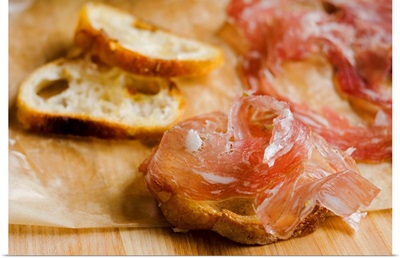 Fresh prosciutto ham with bread