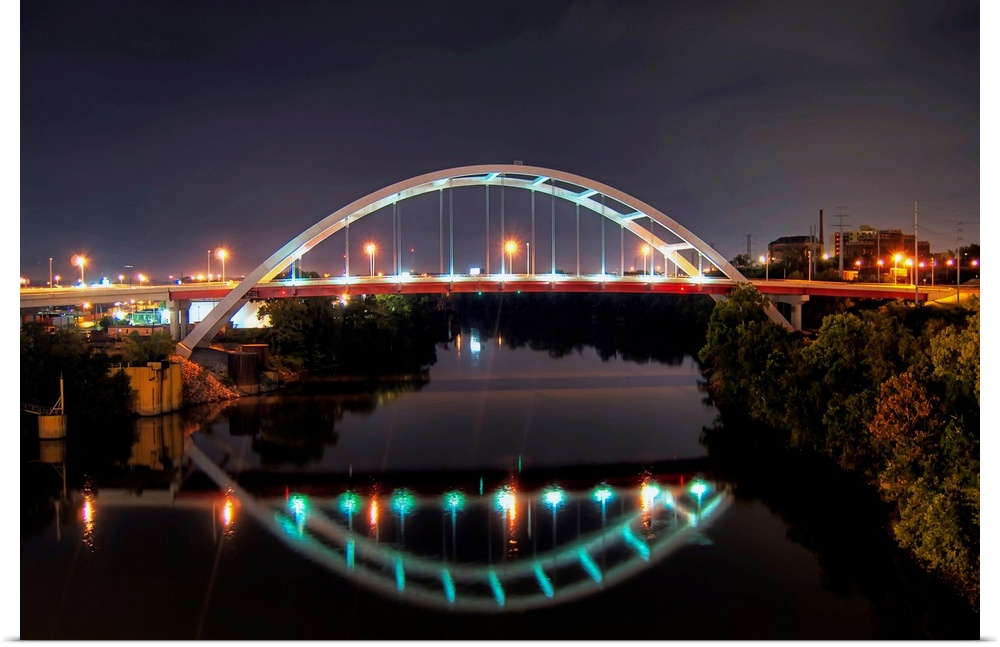 Arch of Gateway bridge over Cumberland river in  Nashville at night.