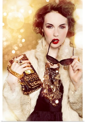 Glamorous woman with gold chains and fur coat