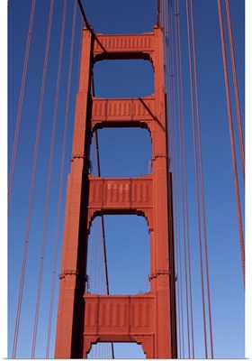 Golden Gate Bridge Tower against blue sky