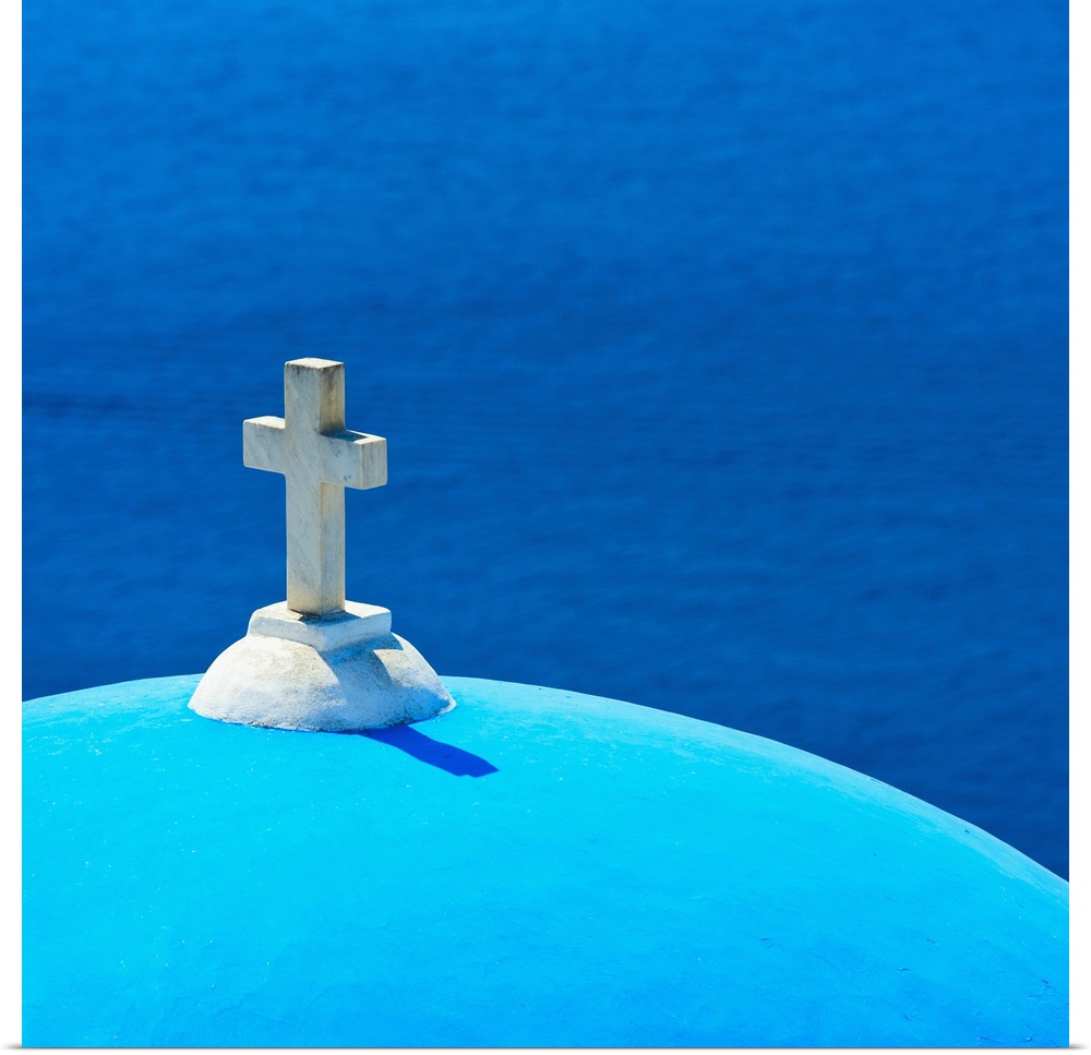 Greece, Cyclades Islands, Santorini, Oia, Church dome with cross by sea