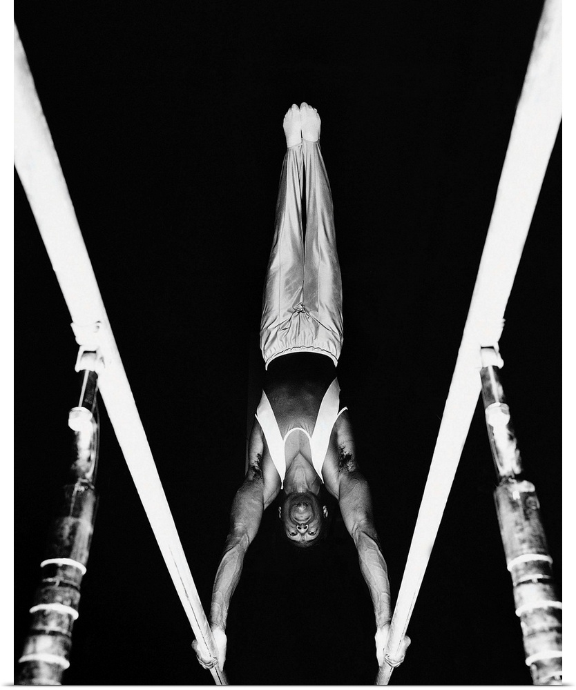 Gymnast on parallel bars