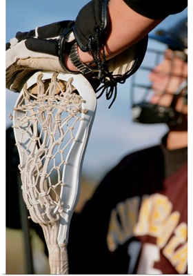 Hand on a Lacrosse Stick