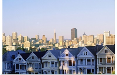 Houses with skyline cityscape behind it, Alamo Square, San Francisco