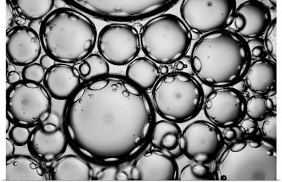 Huge amount of bubbles in fluid. Fluid mixture of oils.